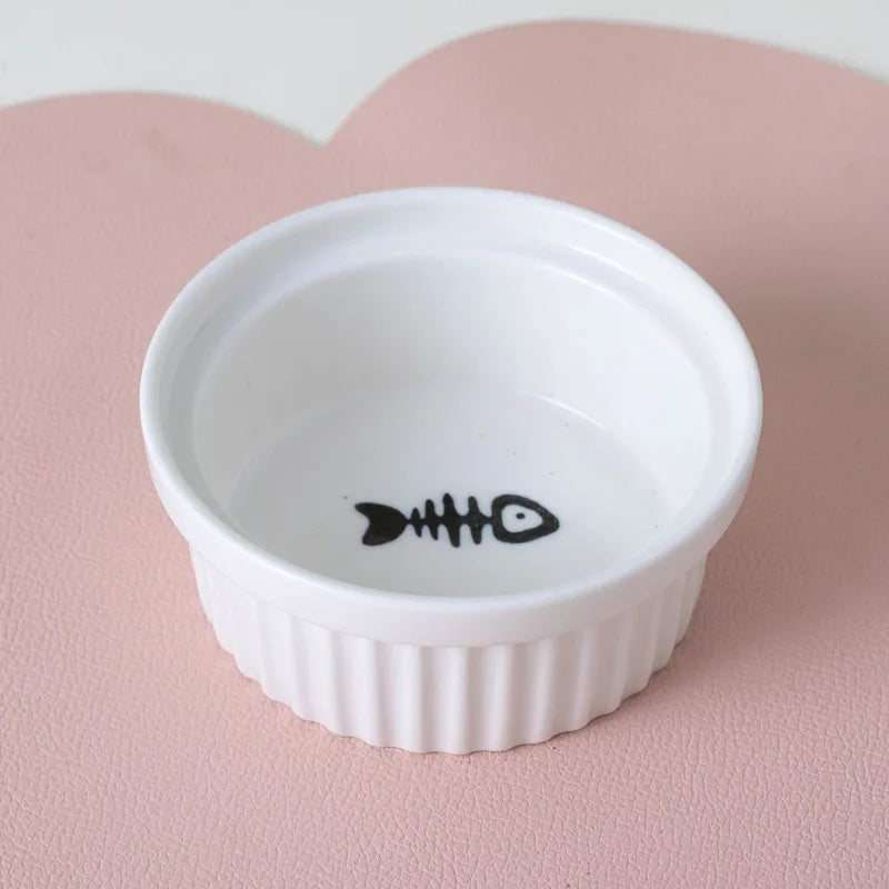 Pet ceramic feeding bowl, double bowl, inclined angle to hold food and water, protect the cat's cervical spine.