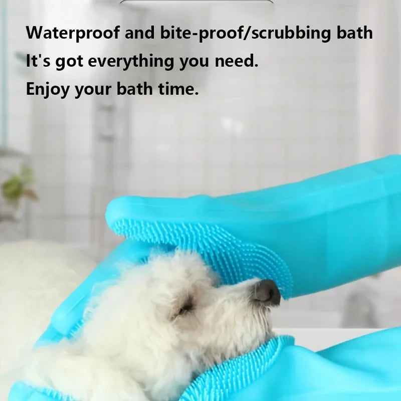 Blue waterproof and bite-proof pet bath gloves being used to scrub a small white dog.