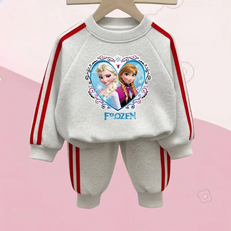 Two-piece heather gray girls' jogger set featuring a Frozen Elsa and Anna heart graphic and red side stripes.