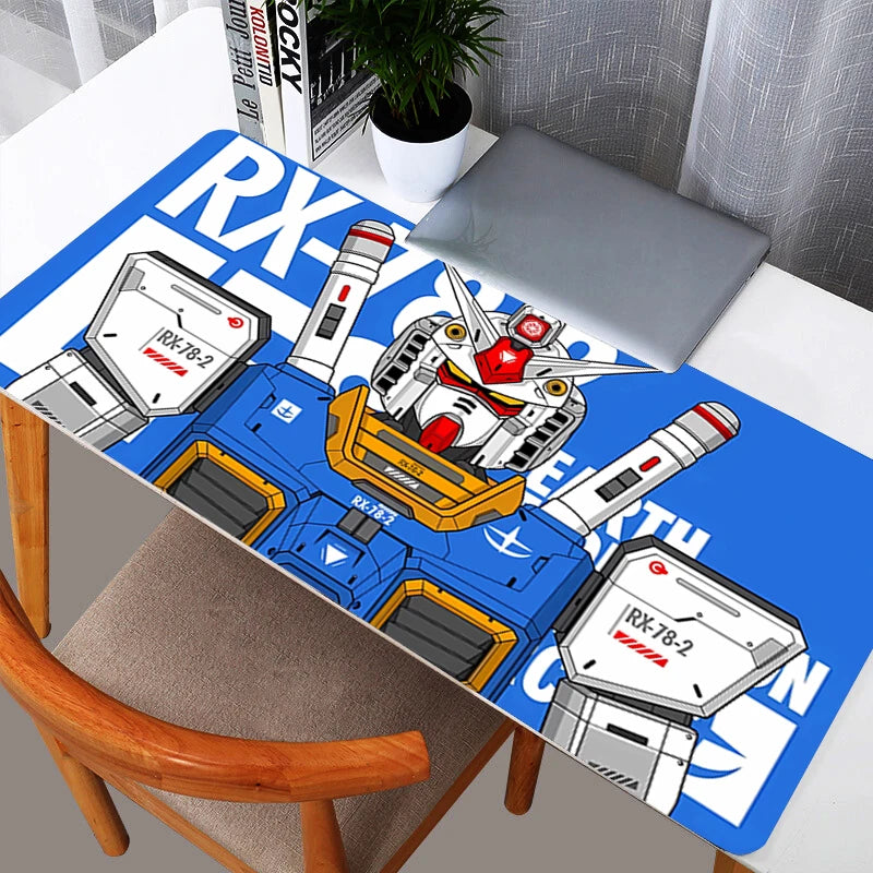 Clean blue and white Gundam RX-78-2 technical XXL gaming mouse pad on a white desk setup.
