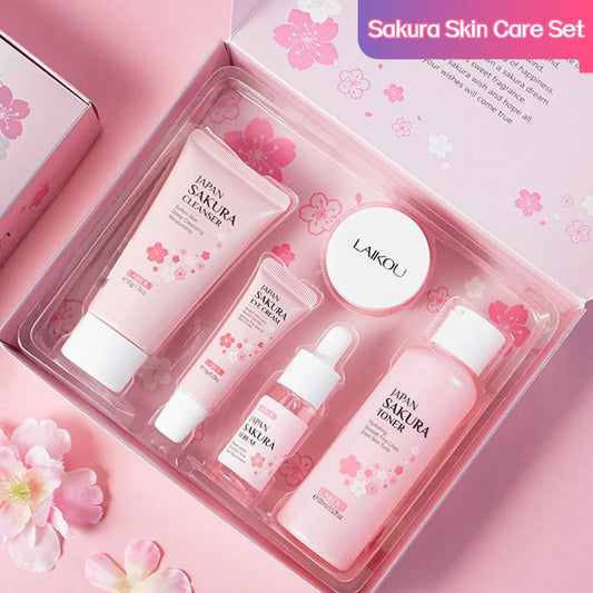 Woman smiling with Sakura Skin Care Set 5-piece suit including serum, toner, and cleanser.