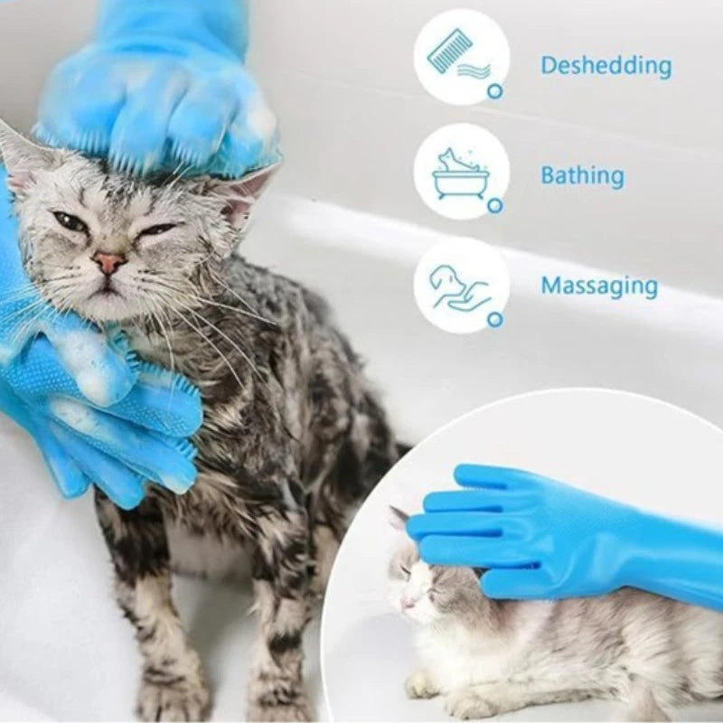 Blue silicone pet grooming gloves being used to bathe and massage a cat in a bathtub.