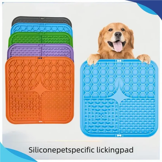 A variety of colorful silicone pet licking pads in orange, blue, green, and purple with a happy Golden Retriever.
