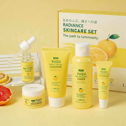 Top view of the Yuzu Vitamin C skin care gift box showing the complete 5-piece rejuvenating routine.